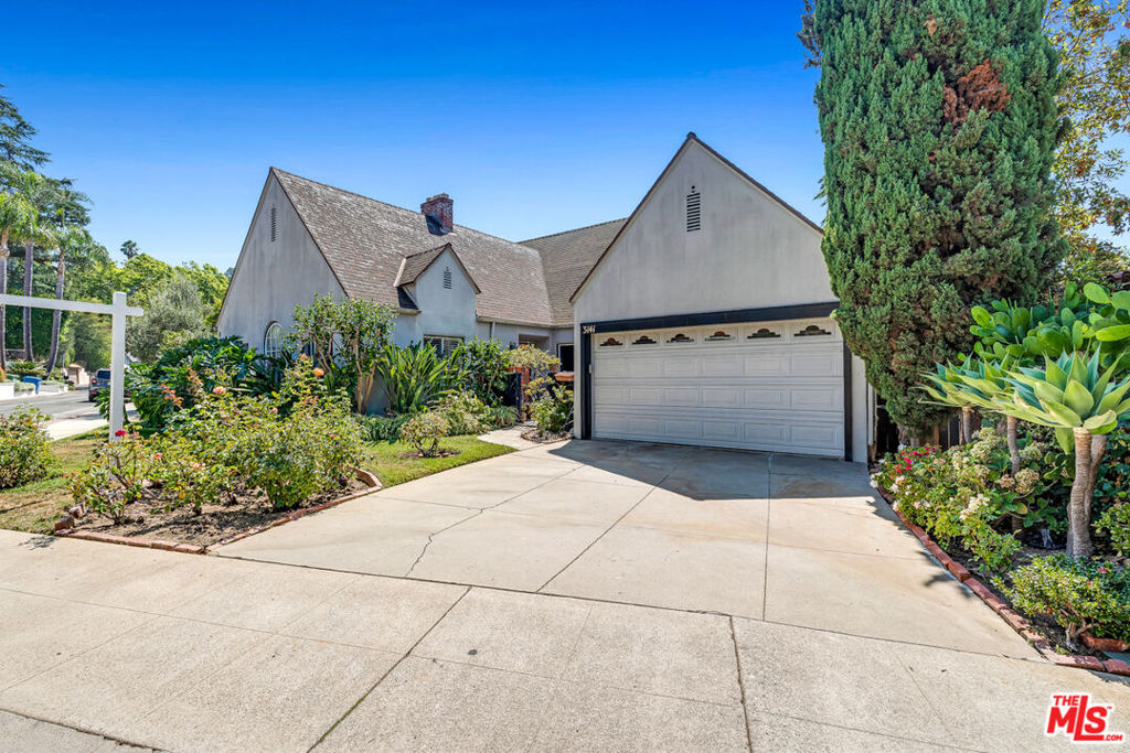 1927-built traditional home located in the highly coveted Hollywood Knolls neighborhood now being offered for sale for the first time in over 50-years. This lovely 2-bedroom 3-bath fixer home features many original details and has fantastic potential along with a spacious multi-room bonus space on the lower level. The living room features an arched window, tall ceiling, a fireplace and beautiful wood floors. The formal dining room is located off the foyer and is a perfect spot for dinner parties and gatherings. The kitchen is spacious with many windows and a 1/2 bath is located off the adjacent laundry room. The den off the kitchen has beautiful views overlooking the Hollywood Knolls and Hollywood Hills. A good sized sunny deck off the den was recently replaced and is a perfect spot for morning coffee and entertaining. The main bath features vintage tile and the primary bedroom is ensuite and offers generous closet space and direct access to the deck. Minutes from Universal Studios, Warner Brothers Studios and Disney Studios, Whole Foods, Trader Joe's, Vons, great restaurants, shopping and parks. Hiking trails and gorgeous Lake Hollywood are right up the street.