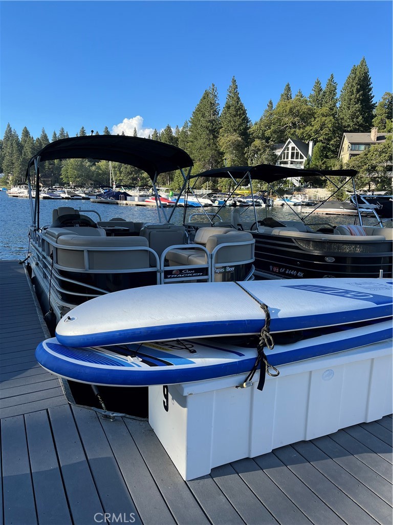 MBM6, Slip 9. Sparkly, cool dock slip in coveted Deep Water. Great access to picnic area, bathrooms and the calm blue waters of Meadow Bay. Deck is all Trex closest to Trail #36 and East of 27451 North Bay. Great price for a front row seat to annual Fireworks Celebration on July 4th.
