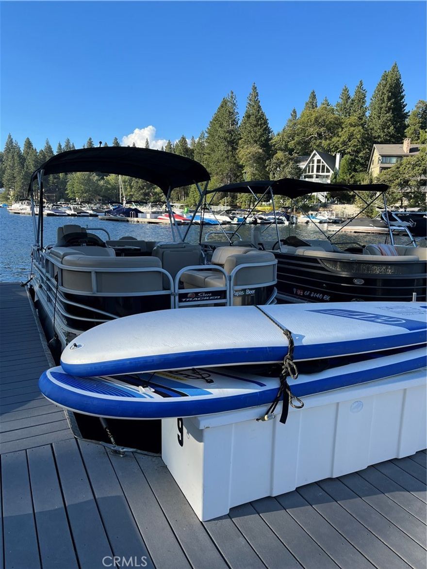 MBM6, Slip 9.  Sparkly, cool dock slip in coveted Deep Water.  Great access to picnic area, bathrooms and the calm blue waters of Meadow Bay. Deck is all Trex closest to Trail #36 and East of 27451 North Bay. Great price for a front row seat to annual Fireworks Celebration on July 4th.