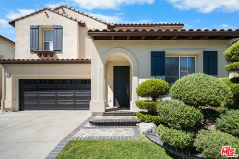 Photo of 11071 Tamberly Lane, Los Angeles, CA 91042 (MLS # 26985813)
