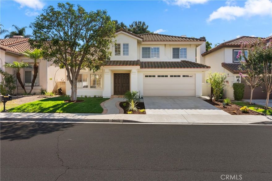 Welcome to your dream home in the highly sought-after Califia neighborhood of Mission Viejo! This beautifully remodeled 3-bedroom, 2.5-bath residence blends modern elegance with timeless comfort, offering thoughtful upgrades and stylish finishes throughout.



Step inside to find luxury vinyl plank flooring, brand new recessed lighting, and fresh interior and exterior paint that create a bright and inviting atmosphere. The brand new remodeled kitchen is a showstopper, featuring stunning white oak cabinetry, quartz countertops, and stainless steel appliances—perfect for both everyday living and entertaining.



Soaring cathedral ceilings and double-pane windows fill the home with natural light, while a custom floor-to-ceiling fireplace adds warmth and sophistication. The formal living and dining rooms overlook the sparkling pool, providing the ideal space for gatherings and celebrations.



Upstairs, the spacious primary suite offers a true retreat with a walk-in closet, dual sinks, custom-tiled oversized shower, and abundant light. Two additional bedrooms share a beautifully remodeled bathroom with a designer tile inlay and new cabinetry.



Enjoy Southern California living at its finest in your private backyard oasis, complete with a newly resurfaced swimming pool and patio area perfect for entertaining or relaxing under the sun. Additional highlights include a brand new AC unit, new jute chandelier, and brand new vinyl slider for seamless indoor-outdoor living.



As a resident of Mission Viejo, you’ll enjoy exclusive Lake Mission Viejo privileges, including access to beaches, docks, fishing, boating, concerts, Fourth of July celebrations, seasonal events, and more.



This turnkey home offers modern luxury, resort-style amenities, and a prime Mission Viejo location—ready for you to move in and enjoy!