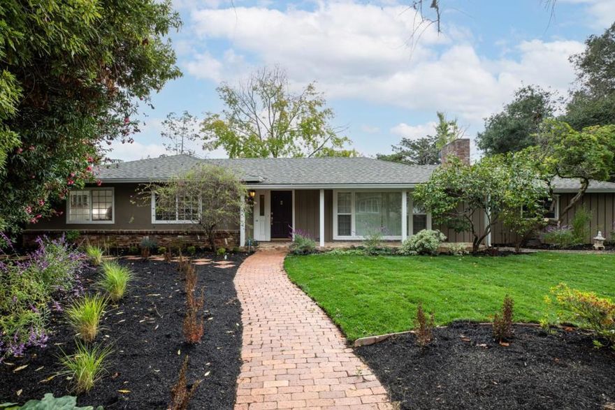 Beautifully updated, this classic ranch offers convenient single-level living on a tucked-away cul-de-sac in North Los Altos. The 3-bedroom, 2-bath floor plan, including a primary suite, reflects pride of ownership and thoughtful new updates such as refinished and new hardwood floors, fresh paint, and an all-new bathroom. A spacious living room with marble-surround fireplace opens to the formal dining room, while the eat-in kitchen features white cabinetry, a greenhouse window above the sink, and stainless steel appliances including a gas cooktop. A bonus family room adds wonderful versatility for work, play, or media, plus there is a bedroom that works equally well for a home office with its dual entry to the foyer. Outside, the large corner-style lot is surrounded by mature trees and refreshed landscaping with ivy-covered fences and expansive brick patios for entertaining. This move-in ready home enjoys an exceptional location just over one mile from the Village and with access to top-rated Los Altos schools.