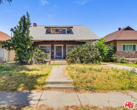 Photo of 1247 W 49th Street, Los Angeles, CA 90037 (MLS # 26844639)