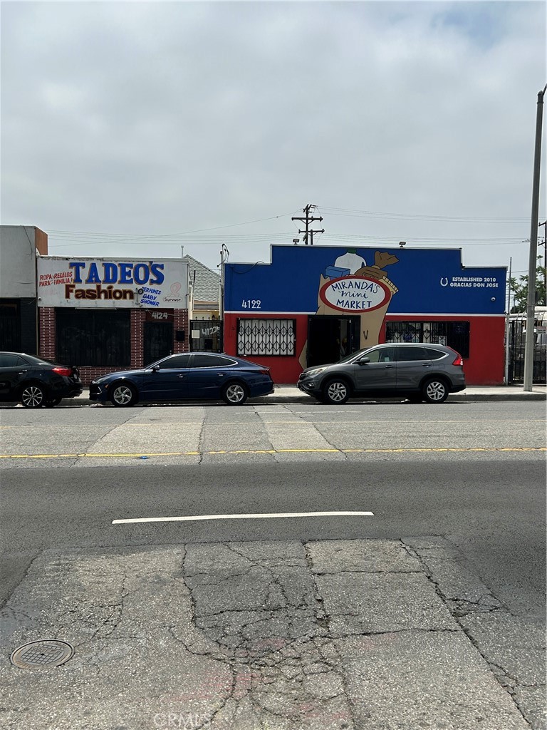 Discover an unparalleled investment opportunity at 4122 Whittier Blvd, Los Angeles, CA 90023, nestled in the vibrant heart of East Los Angeles. This dynamic mixed-use property is a rare gem, featuring a bustling storefront, a spacious two-bedroom house, and a cozy one-bedroom unit—perfect for generating diverse revenue streams or reimagining as a bold development project.
Strategically positioned on the iconic Whittier Boulevard, a high-traffic corridor, this property enjoys exceptional visibility and accessibility. Located just minutes from the 5, 60, and 710 freeways, it’s a mere 10-minute drive to the electric energy of Downtown LA, making it a prime spot for commuters and businesses alike. The surrounding area is thriving, with newly completed high-density developments and another exciting project nearing completion, signaling a neighborhood on the rise.