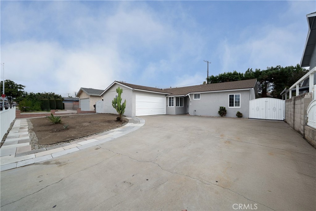 A must-see, move-in-ready home in an excellent area of Anaheim!
This property includes 3 bedrooms, 1.5 bathrooms, and over 1,283 sq. ft. of living space. Features include new exterior paint, tile flooring throughout (with carpet in two bedrooms), a spacious living room, granite kitchen countertops, and a long driveway that allows for RV access or plenty of parking. Walking distance to schools, parks, and stores. Conveniently located near the 5 and 91 freeways.
Front door faces East/West.