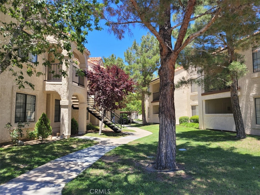 Stunning 2 Bedroom, 2 Bath Condo in Palmdale, CA - Move-In Ready!
Experience modern comfort in this beautifully upgraded upper unit condo located in a desirable Palmdale community. This home features 2-Primary bedrooms and 2-bathrooms. Every inch of this unit has been renovated from the studs up, offering a fresh, contemporary feel with all new finishes and appliances.
The spacious kitchen features brand new stainless steel built-in microwave, dishwasher, and stove paired with sleek Shaker cabinets and exquisite granite counters. New fixtures for lighting and sinks enhance the overall modern aesthetic. The interior has been freshly painted, complemented by new carpet in bedrooms (as required by HOA for upstairs units) and new light fixtures throughout.
Both bathrooms boast stylish Shaker-style cabinets, new granite counters, updated faucet fixtures, new shower fixtures, toilets, and flooring—turning these spaces into your personal oasis. The unit also includes a new stackable washer and dryer, adding convenience to your daily routine.
Enjoy a comfortable climate year-round with a brand new HVAC system that provides both air conditioning and heating.. The covered balcony has additional storage and a new water heater for your convenience.
The community amenities are just as impressive: two sparkling swimming pools, covered carport parking, gated access with 24-hour security, and guest parking. Located close to shopping centers and freeways, this community offers unbeatable convenience for commuters.
Don't miss out on this exceptional opportunity to own a completely renovated, move-in ready condo in Palmdale. Everything is new, offering a perfect blend of comfort, style, and convenience!