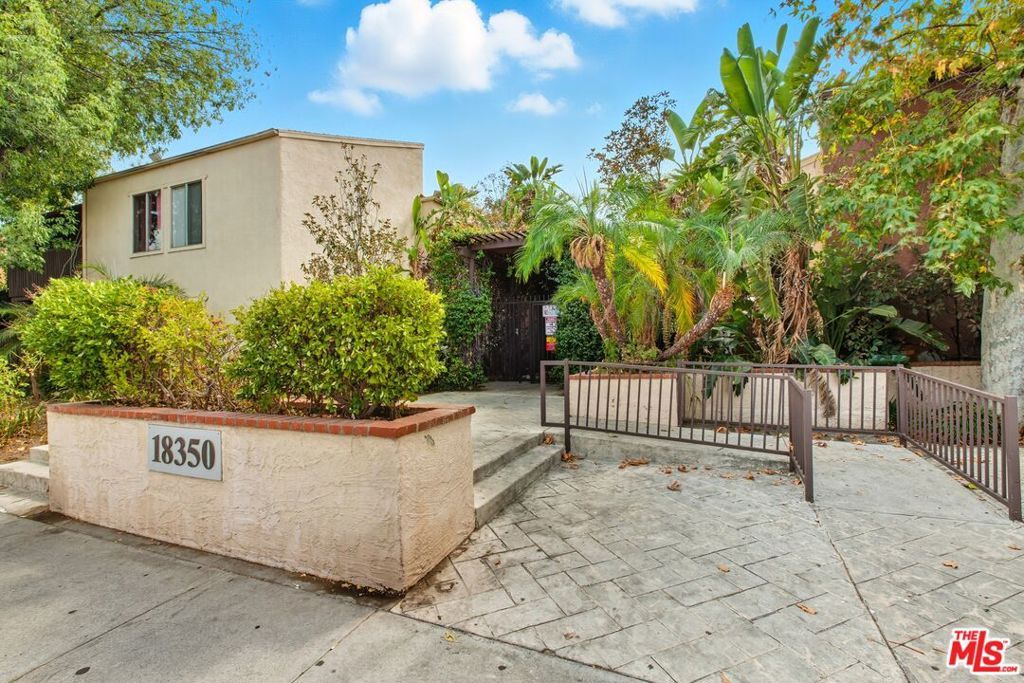 Photo of 18350 Hatteras Street #253, Tarzana, CA 91356 (MLS # 26652323)