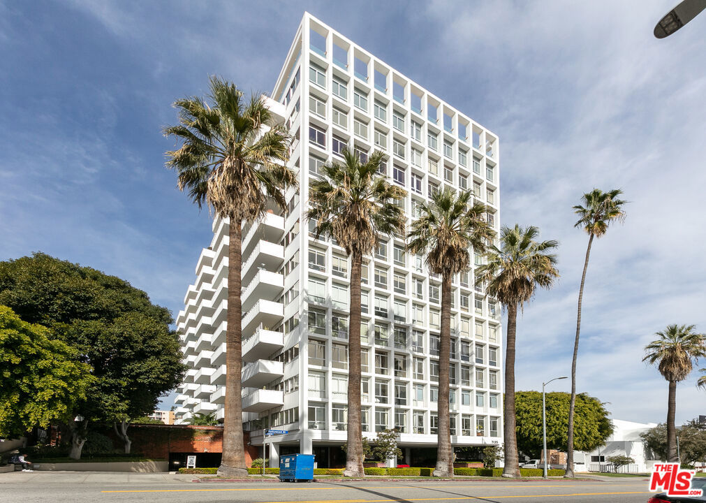 Experience elevated living at the iconic Hollywood Versailles Tower. This beautifully remodeled 1-bedroom, 1-bath residence offers a seamless blend of style, comfort, and convenience in the heart of Hollywood. The spacious kitchen boasts custom blue cabinetry and stainless steel appliances, flowing effortlessly into an open-concept living and dining area - perfect for entertaining. Step onto the generous private balcony and take in sweeping west-facing views of the city skyline and Hollywood Hills. The serene bedroom features ample closet space, while the spa-inspired bathroom showcases dual sinks, designer tile work, and a jetted soaking tub. Thoughtful extras include two dedicated parking spaces plus utilities and premium cable services - water, sewer, trash, internet, cable TV, and premium channels - fully included. Residents of Hollywood Versailles Tower enjoy full-service amenities: a 24-hour doorman, valet and guest parking, front desk concierge, pool and sundeck, fitness center, game room, and a dedicated dog run. All just moments from the Hollywood Walk of Fame, Runyon Canyon trails, Metro station, and world-class shopping and dining at Hollywood & Highland.