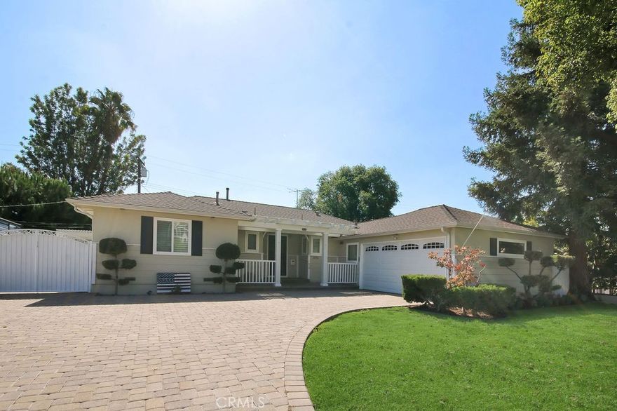Welcome to 2616 Balfour, a beautifully updated single-story home in one of Fullerton’s desirable neighborhoods. Set on a spacious 8,400 sq. ft. lot, this charming residence blends warmth, comfort, and modern updates with inviting outdoor living spaces you’ll love year-round.



Step inside to find a light-filled living room anchored by a stacked-stone fireplace and gleaming hardwood floors that flow throughout. The layout extends into a bright bonus sunroom, perfect as a second living area, home office, or playroom — offering direct access to the backyard.



The remodeled kitchen features rich wood cabinetry, sleek countertops, stainless steel appliances, recessed lighting, and an inviting dining area overlooking the side yard. Two beautifully updated bathrooms include designer tile, newer vanities, and quality finishes that make each space feel fresh and spa-like.



Outside, enjoy multiple entertaining areas including a covered patio, expansive lawn and garden area, and a separate covered side yard — ideal for a potting station or hobby center. A detached outdoor bonus room provides the perfect space for a home office, gym, extra storage or “she/he shed.” The manicured yard, trimmed landscaping, and updated hardscape create a peaceful retreat you’ll be proud to call home.



Additional highlights include fresh interior paint, dual-pane windows, plantation shutters, central heating and air, a spacious two-car garage with a wide paver driveway for extra parking and a large side gate with direct access to the backyard.



Located in an established neighborhood near top-rated schools including Troy High School and CSUF, shopping, parks, and convenient freeway access. 2616 Balfour offers both comfort and lifestyle. Move-in ready, beautifully maintained, and ready to impress.
