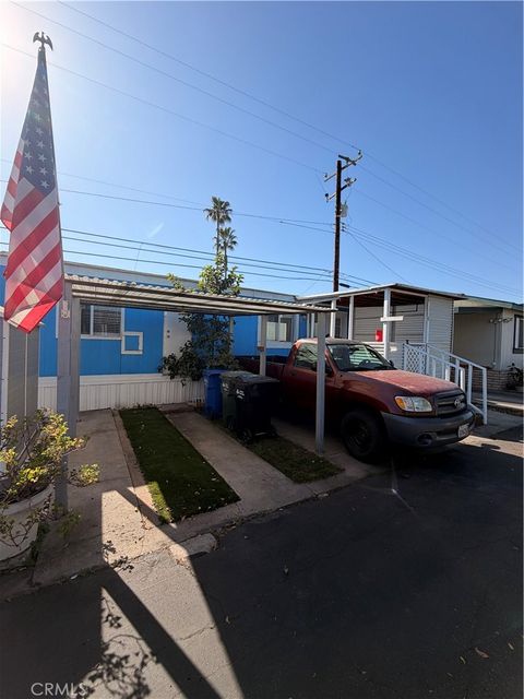 Photo of 16511 Garfield Ave #D40, Paramount, CA 90723 (MLS # DW26024994)