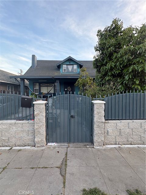 Photo of 1046 W 49th St, Los Angeles, CA 90037 (MLS # CV26071048)