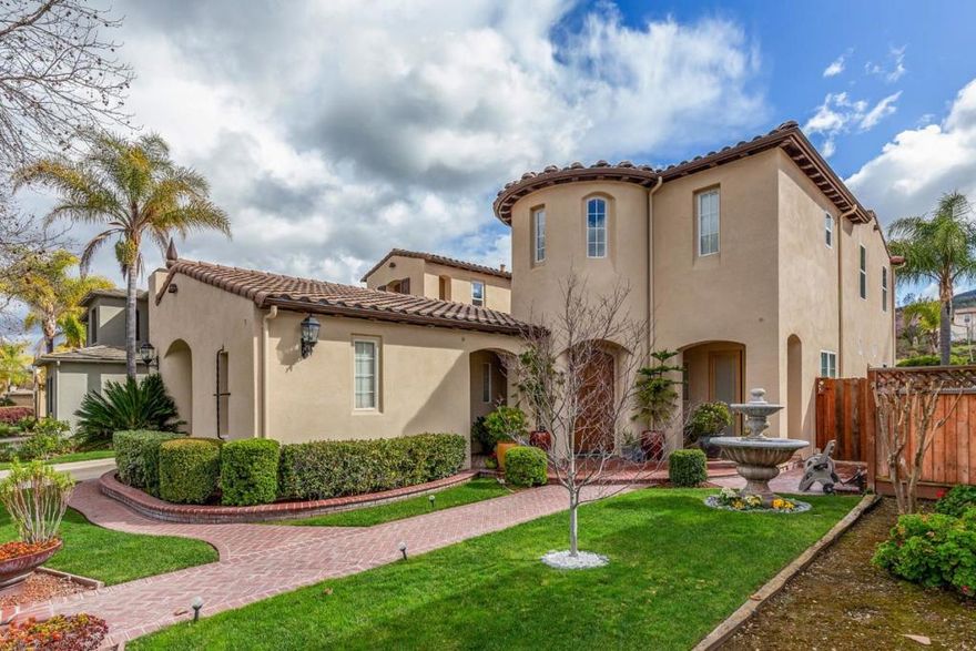 This lovely Birkdale model is located in the gated community of Eagle Ridge Golf Club. Positioned on the 11th fairway with Uvas Creek in front of the home.  The office includes built-in cabinetry and wood floors.  Large formal dining room.  The kitchen offers tile counters along the perimeter with a granite counter and a sink in the island with a breakfast bar. The kitchen opens to the family room with a fireplace and  built-in entertainment center. The center courtyard is encircled by French doors from the office, dining room and family room.  A separate 1-car garage is included as well.  There is a laundry room, full bathroom and a bedroom with wood floors and a walk-in closet on the first floor.  The primary bedroom features French doors to the balcony for beautiful golf course views. The primary bath includes a large tub flanked by 2 vanities, stall shower and 2 walk-in closets. The front bedroom has views of the wooded area along Uvas Creek from the balcony.  There is a full bath in the hallway with light up mirrors over each sink and custom tile in the shower.  The third bedroom features golf course views. You will also find an alarm system, crown molding and built-in speakers. Beautiful lap pool with a waterfall and spa plus a pergola just outside the kitchen door.