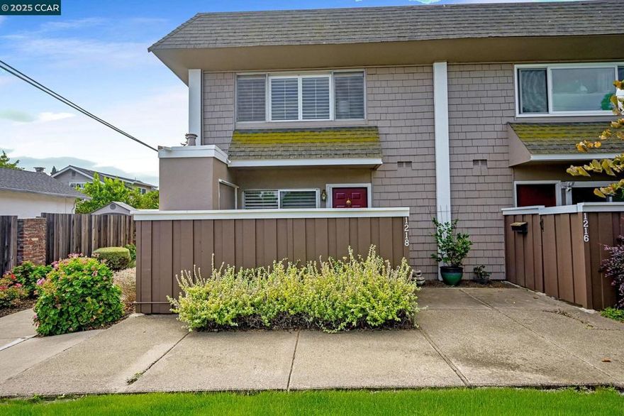 Open hse Sun, Oct 12,2025  2-4pm. Rare end unit next door to single family neighborhood and across the street from Len Hester Park. Spacious 2 story unit with decorator touches throughout. Built-in cabinetry in living room & corner decorator fireplace, cabinetry & Murphy bed upstairs with cabintry & build in desk looking out to the park, updated kitchen. Refrigerator included. Washer & Dryer included in upstairs laundry area . Windows & Sliding doors updated (except entry sliding door) Custom shutters throughout. Beautifullyl upgraded stairway bannister. Home features front courtyard entry, backyard and patio, generous upstairs balcony. Pleasant views to back patio & from upper balcony. Nice greenbelt area separating the unit from the street. Across Bancroft Rd to Iron Horse trail.