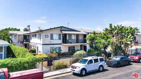 Photo of 2027 S Ridgeley Drive, Los Angeles, CA 90016 (MLS # 26874421)