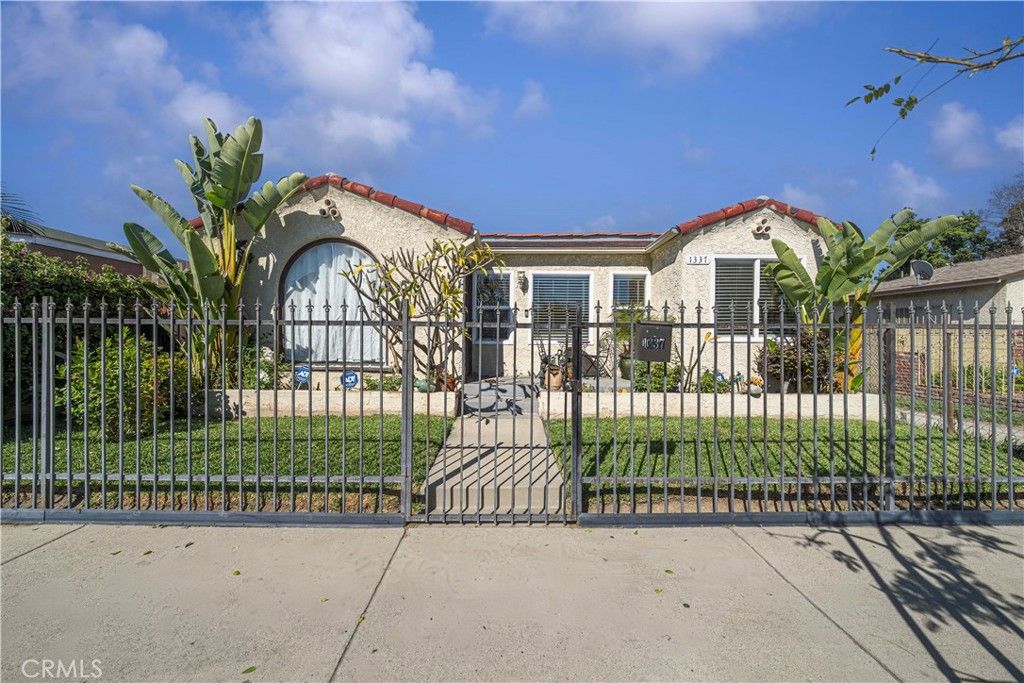 Photo of 1337 W Gage Ave, Los Angeles, CA 90044 (MLS # RS26045295)