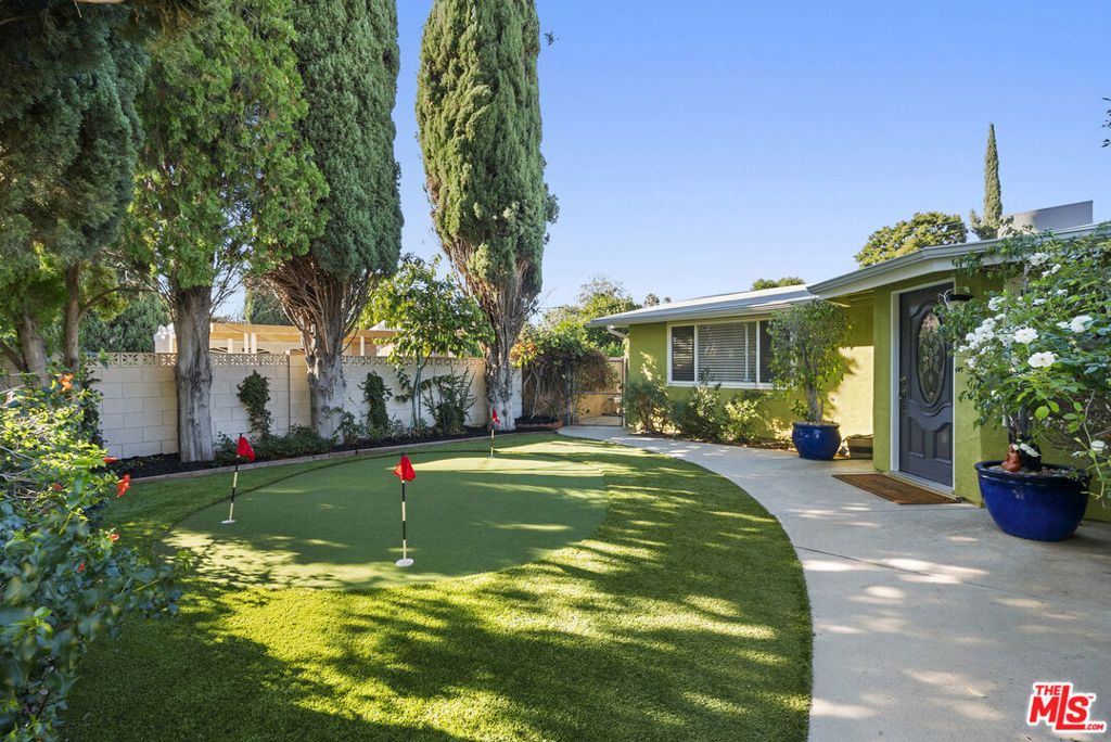 Photo of 20307 Mobile Street, Winnetka, CA 91306 (MLS # 25593425)