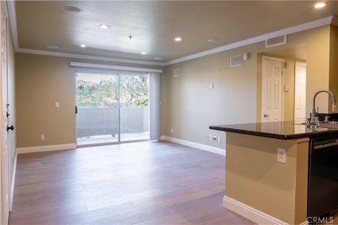 Photo of 1035 La Terraza Cir #104, Corona, CA 92879 (MLS # PW26119761)