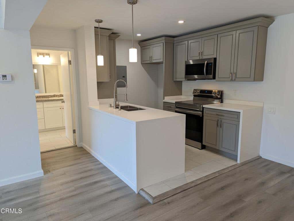Photo of 5460 White Oak Avenue #G222, Los Angeles, CA 91316 (MLS # P1-26764)