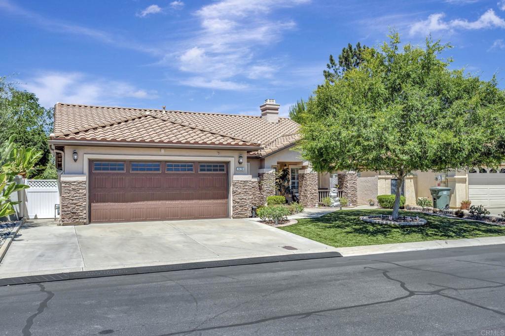 Highly sought after, largest model and rarely available plan 5 in Crown Hills. This 4 bedroom, 2 bath home has it all - Owned Solar, recently installed HVAC system, and remodeled inside and out! This home has many designer touches, including cathedral ceilings, plantation shutters, recessed lighting, dual fireplace serving both the living room & family room. The community has a large, well-maintained pool and spa, a well-outfitted gym and a community center available for large groups. Tennis courts with lots of well-maintained green spaces with walking paths. All this and a low HOA. You will love the friendly neighbors and the whole Alpine community.
