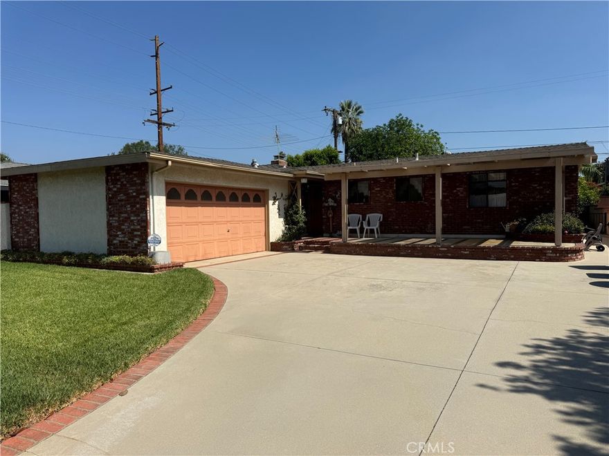 Charming and quaint, this Covina home is perfectly located across the street from Ben Lomond Elementary School. Step inside to a great floor plan designed for comfort and function, featuring a welcoming kitchen with a center island that makes cooking and entertaining a breeze. Cozy fireplace in living room to gather around. Beautiful hardwood floors.  A block wall surrounds the property, providing total privacy and peace of mind. Enjoy the convenience of nearby shopping, stores, and everyday essentials just minutes away. This delightful home combines warmth, practicality, and a prime location—ready to be your new place to call home.