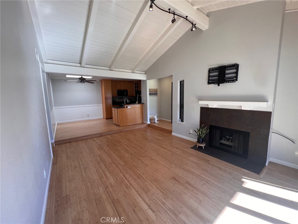 Open House Sat. 7/26 12 to 3:00 pm. Beach Close Condo in gated Seaspray Complex. This Gorgeous End Unit offers 3 Bedrooms, 2 Baths, with almost 1200 Sq. Ft. of Living Space. This Home Boasts one of the BEST Interior Locations in the Complex and is only a Mile and 1/2 to the Beach! The Entry leads you into a Spacious Living Room which features Soaring Wood Beamed Ceilings, Fireplace, Newly re-finished Bamboo Flooring, Fresh Paint, and a Wall of Windows that Bring a Ton of Natural Light. The Kitchen offers Granite Counter Tops, Custom Cabinetry,Tile Backsplash, Pantry Storage, Skylights, Newer Appliances, a Generous Dining Area and Fridge is included! The Open Floor Plan is great for Entertaining! The Living Room Sliding Glass Doors lead you out to one of your 2 Covered Private Patios which overlook a Huge Tree Lined Greenbelt. The Expansive Primary Suite offers Vaulted Ceilings, a Wall of Custom Closets, Newer Paint, Newer Carpet, and Sliding Glass Doors leading to Covered Patio Area. The Newly Remodeled En-Suite Primary Bathroom features an Extra-Long Vanity Area, Granite Counters,New Cement style Tile flooring, New Custom Tiled Large Soaking Bathtub/Shower Combo, Dual Shower Heads and Easy Close Glass Door. The Secondary Bedrooms are nice in Size, Freshly Painted, New Mirrored Closet Doors, Ceiling Fans and one features a Vaulted Ceiling. The Newly Remodeled Guest Bathroom is Freshly Painted and Offers a Granite Top Vanity, New Cement Style Tile Flooring, New Custom Tiled Tub/Shower Combo, Dual Shower Heads with Custom Easy Close Glass Door. The Home also has an Inside Laundry Room, Washer/Dryer included, Entry Coat Closet and Linen Storage in the Hall. Unit Comes with a Detached One Car Garage and a Addt'l Assigned Parking Spot. The Community features a Pool, Spa, Clubhouse, Tennis and Volleyball Ct, Greenbelt Areas, and plenty of Guest Parking. There are 2 Private Gates in the Complex that give you access the Bike/Walking Trails leading you directly to the Beach and Ocean! The Complex is located near Top Rated Schools, Restaurants, Hiking Trails, Shopping, and Trader Joe's is right across the street.OTHER DETAILS: Available 9/1/25. One Year Lease Required. LEASING REQUIREMENTS: 1) All Adults (18 or older) who will reside in the home must submit an online application with a copy of their ID and Proof of Income (if any) 2) Minimum Credit Score of 700 is required. 3) Gross Combined Household Income should be a minimum of 3x the rent. 4)No Prior Evictions.