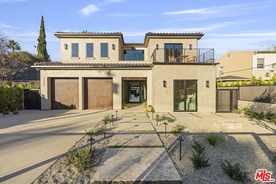 Welcome to Casa Verde, one of the largest and most extraordinary homes ever built south of the Boulevard in Sherman Oaks. Set on an expansive 13,000 sq ft lot, this 5-bed, 7-bath estate blends timeless European influence with high-end contemporary design, featuring hand-applied limewashed walls, a sculptural plaster staircase, and natural light pouring in from every angle. Step through the custom oversized pivot door and you're immediately met with soaring ceilings and a floor plan crafted for true indoor/outdoor entertaining. A large custom bar sits at the center of the home, creating a stunning focal point and seamless flow into the expansive dining area, where floor-to-ceiling sliders open to a private outdoor sanctuary anchored by a limestone fireplace. The chef's kitchen features custom white oak cabinetry, travertine counters, and panel-ready appliances that disappear into the design. A hidden butler's kitchen with its own cooktop, sink, dishwasher, and walk-in pantry keeps prep work tucked away when hosting. The generous family room opens to the oversized backyard with ample patio space, an outdoor kitchen, large pool, two covered cabanas, and a full bathroom. The main floor is completed with a large home theater, office, bedroom and reading nook. Upstairs are 4 additional bedrooms, each with its own en-suite bath and walk-in closet. The oversized primary suite offers a floor-to-ceiling stone fireplace, two balconies, an expansive walk-in closet, and a private bonus room ideal as a yoga studio, nursery, or second closet. The spa-like bathroom features a large zellige-tiled rain shower, freestanding tub with mountain views, makeup vanity, and dual water closets.Tucked in an exceptional walkable pocket, Casa Verde is moments from some of the city's best restaurants and coffee shops, Anajak Thai, Bacari, The Blvd, Cream, and more, as well as The Buckley School. This is a rare opportunity to own a statement property defined by scale, design, and craftsmanship.