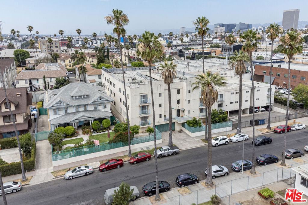 * BIG PRICE REDUCTION* Don't miss this rare and unique opportunity to own a highly valuable income property in a prime location! This well maintained 18 unit apartment complex with a resident manager is a strong investment with a gross income $36,490, boast an exceptional GRM 12.5, outstanding CAP rate of 5.3% and tremendous upside potential. The property is situated in a highly desired rental market strong investor and tenant demand. This three-story apartment complex, reminiscent of a condominium, was built in 1991 and has been impeccably managed and maintained ever since. The total square footage of the improvements is an impressive 21,789, sitting on a sizable 13,050 square foot lot, zoned LA R4-1 & TOC Tier 3, presenting additional development possibilities. The building's charming three-story, features an airy courtyard that provides access to all units, including an elevator from the parking lot. Comprising of 17 units with 2Beds and 2Baths, along with one unit featuring 2Beds and 1Bath. Each of the tastefully upgraded 2Beds units spans approx. 1,100 sf, offering a spacious living room, separate rooms, dining area, and central AC(16units). The apartments also boast ample closet space. The upgrade include separate water heaters, well- appointed kitchens with vent out hoods, dishwasher, stoves, beautiful countertops, cabinetry, and luxurious bathtubs and vanities. The plumbing has been installed to copper, and features CCTV surveillance. The on-site laundry room generates additional income. Additionally, each unit has separate gas and electric meters. Security are prioritized with a gated and secure parking garage offering 10 side-by-side parking spots and 22 tandem spaces(total 32 spaces). Convenient access to the FWY 110 and 10, situated just west of Downtown LA, easy access to major markets, restaurants, banks, healthcare facilities, and other business. Don't delay - seize the chance to make this one-of-a-kind investment property your own!