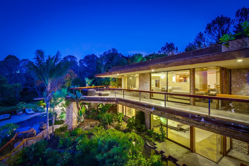 Jaw dropping panoramic ocean views surround this exquisite compound. Three acres of lush foliage and gated entry with 1/4 mile driveway offer ultimate privacy. Designed by famous architect Henry Hester, this home is the perfect escape atop La Jolla. Warm wood elements, modern lines, exquisite finishes, and natural elements provide a feeling of luxury and comfort. The perfect blend of work and play with a large luxury office, stunning infinity pool, pool house, 3 hole putting green, tennis court, and more! Neighborhoods: Hillside Equipment: Dryer,Garage Door Opener,Pool/Spa/Equipment, Range/Oven, Washer Other Fees: 0 Sewer: Sewer Available Topography: LL,GSL