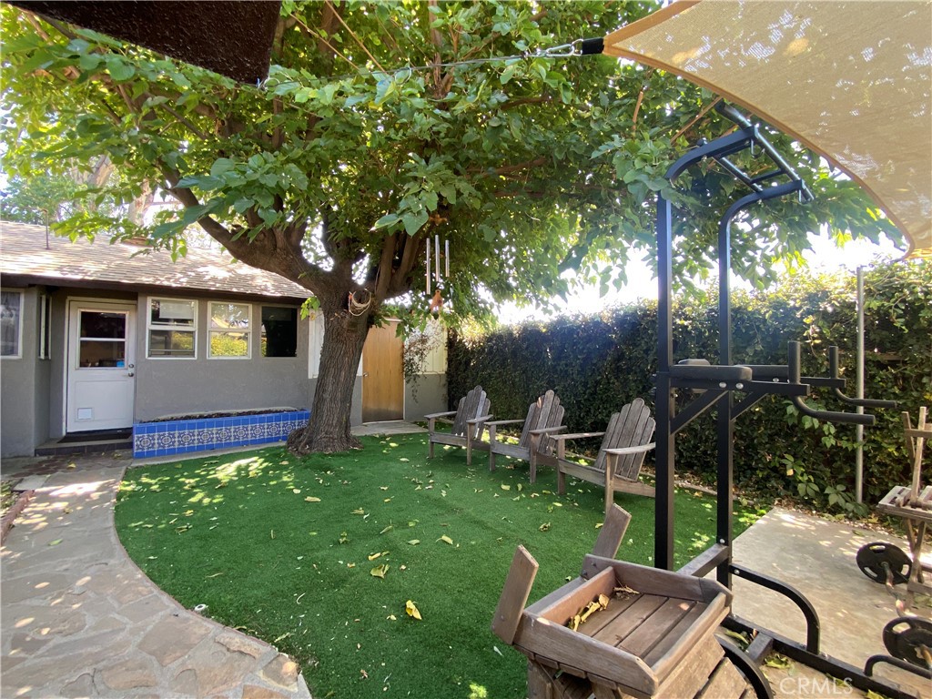 Charming Single-Story Home in Highly Desired Northern Yucaipa
Welcome to this inviting single-story home in one of Northern Yucaipa’s most desirable neighborhoods. Set on a generous lot in a peaceful setting, this 2-bedroom, 1-bath home features modern updates while maintaining its timeless charm.
Inside, you’ll find an upgraded kitchen and bathroom, along with copper plumbing (installed in 2018) for added peace of mind. Cozy up in the family room with a wood-burning fireplace, or enjoy the character of a potbelly stove just off the kitchen. Beautiful wood top custom bar separating living room from dining room. The garage includes an additional bathroom and convenient laundry area, making the space both functional and versatile.
Outdoors, the property truly shines with a spacious front yard, a private backyard, plus both a side yard and a lower yard that offer endless possibilities such as RV parking or all your toys.  Whether you envision a garden, play space, or expanded entertaining areas, the mature trees create wonderful shaded, secluded spaces. A workshop in the back provides the perfect spot for hobbies, projects, or extra storage.  Plus a basement for more storage.  
All of this comes with the unbeatable tranquility of a quiet neighborhood, while still being close to everyday conveniences. Local shops, coffee spots, and parks (multiple) are just minutes away, with easy access to freeways, Downtown Redlands, Palm Springs, San Bernardino Mountains and local casinos—all while maintaining that warm small-town feel.