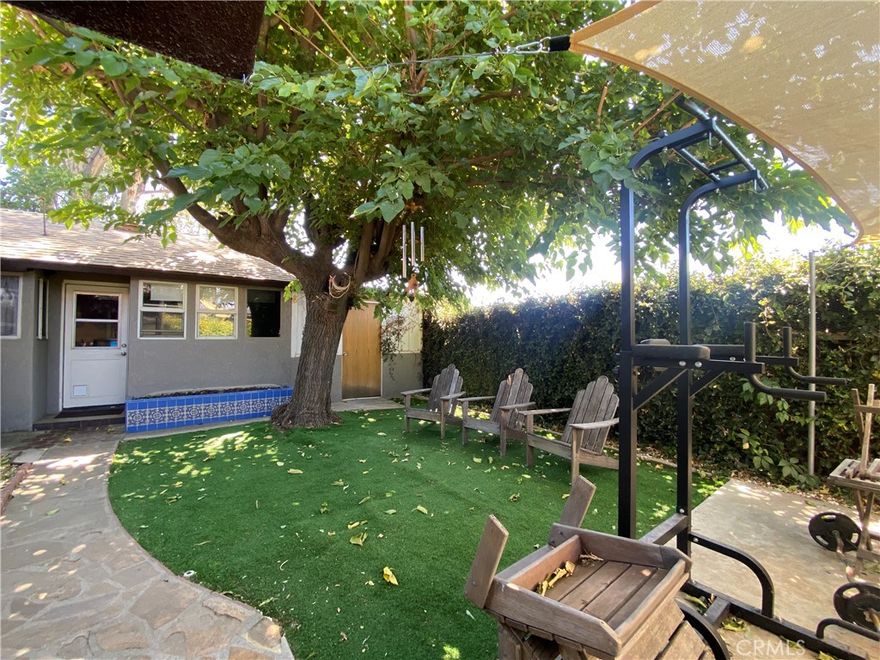 Charming Single-Story Home in Highly Desired Northern Yucaipa
Welcome to this inviting single-story home in one of Northern Yucaipa’s most desirable neighborhoods. Set on a generous lot in a peaceful setting, this 2-bedroom, 1-bath home features modern updates while maintaining its timeless charm.
Inside, you’ll find an upgraded kitchen and bathroom, along with copper plumbing (installed in 2018) for added peace of mind. Cozy up in the family room with a wood-burning fireplace, or enjoy the character of a potbelly stove just off the kitchen. Beautiful wood top custom bar separating living room from dining room. The garage includes an additional bathroom and convenient laundry area, making the space both functional and versatile.
Outdoors, the property truly shines with a spacious front yard, a private backyard, plus both a side yard and a lower yard that offer endless possibilities such as RV parking or all your toys.  Whether you envision a garden, play space, or expanded entertaining areas, the mature trees create wonderful shaded, secluded spaces. A workshop in the back provides the perfect spot for hobbies, projects, or extra storage.  Plus a basement for more storage.  
All of this comes with the unbeatable tranquility of a quiet neighborhood, while still being close to everyday conveniences. Local shops, coffee spots, and parks (multiple) are just minutes away, with easy access to freeways, Downtown Redlands, Palm Springs, San Bernardino Mountains and local casinos—all while maintaining that warm small-town feel.