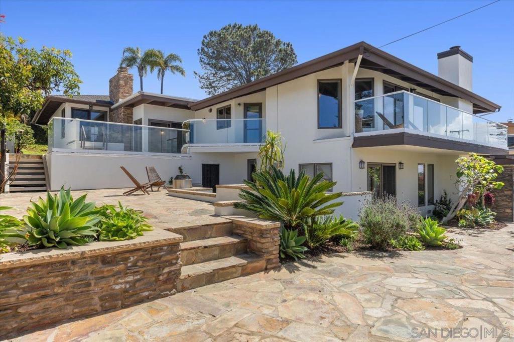 Experience the ultimate in coastal luxury with this exceptional home, ideally located in the prestigious Olde Del Mar neighborhood. Capturing stunning panoramic views and the refreshing Pacific breezes, this expansive residence boasts vaulted, beamed ceilings and an abundance of natural light, creating an inviting and airy atmosphere throughout. Designed for seamless indoor-outdoor living, the home features expansive view decks, private patios, gardens and more, perfect for entertaining or relaxing in tranquility. Experience the ultimate in coastal luxury with this exceptional home, ideally located in the prestigious Olde Del Mar neighborhood. Capturing stunning panoramic views and the refreshing Pacific breezes, this expansive residence boasts vaulted, beamed ceilings and an abundance of natural light, creating an inviting and airy atmosphere throughout. Designed for seamless indoor-outdoor living, the home features expansive view decks, private patios, gardens and more, perfect for entertaining or relaxing in tranquility. The fifth bedroom, complete with a full bath, is situated on the lower level, offering versatility as a private guest suite or current use as a fitness area, enhanced by a portable steam room (which may convey). Property is equipped with Solar Electric & Soft Water Systems. With an enviable walkable location, this residence provides effortless access to the village’s world-class dining, shopping, and the beach. This is coastal living at its finest, where luxury, convenience, and beauty come together in perfect harmony.