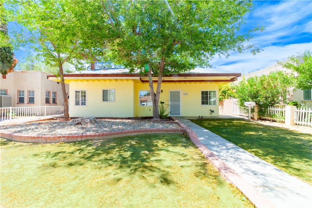 Great investment opportunity in Lancaster! This multi-unit property features a front unit with 2 bedrooms and 1.5 baths, a spacious kitchen, a cozy fireplace, a laundry room, and a large private patio. The second unit offers 1 bedroom, 1 bath, plus a bonus studio with its own bathroom, perfect for extended family or rental income. Enjoy beautiful natural light throughout, with mature trees providing shade in both the front and back yards. A must-see with tons of potential!