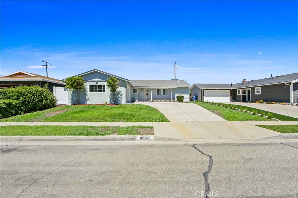 Welcome home to 18543 Adivino Street, a stunning and completely remodeled residence in the desirable Rowland Heights neighborhood! This property has been meticulously renovated from top to bottom, featuring premium new light-toned wood-look flooring and fresh paint that create a bright and modern feel throughout the open living spaces. The heart of the home is the brand-new kitchen, fully equipped with a new refrigerator, stove, high-end range hood, and dishwasher, and beautifully appointed with white shaker cabinetry and elegant quartz countertops. The kitchen features a spacious peninsula extending toward the living room, ideal for high bar stools, casual dining, and additional counter space. Indulge in two fully updated, spa-like bathrooms—one featuring a luxurious walk-in shower and the other a pristine shower/tub combo—both adorned with high-end designer tile and modern LED mirrors for a bright, stylish touch. Enjoy the California lifestyle with expansive front and back yards, providing ample space for outdoor activities, gardening, or simply relaxing in the sun. For added convenience, the attached garage is equipped with a 240V outlet ready for Level 2 EV car charging. Don’t miss this rare opportunity to lease a truly move-in-ready home with luxury finishes and thoughtful modern upgrades throughout!