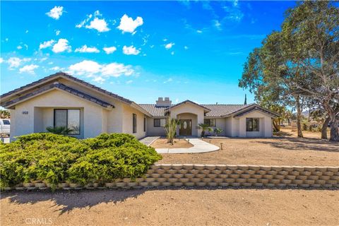 Photo of 58453 Lisbon Drive, Yucca Valley, CA 92284 (MLS # JT26064820)
