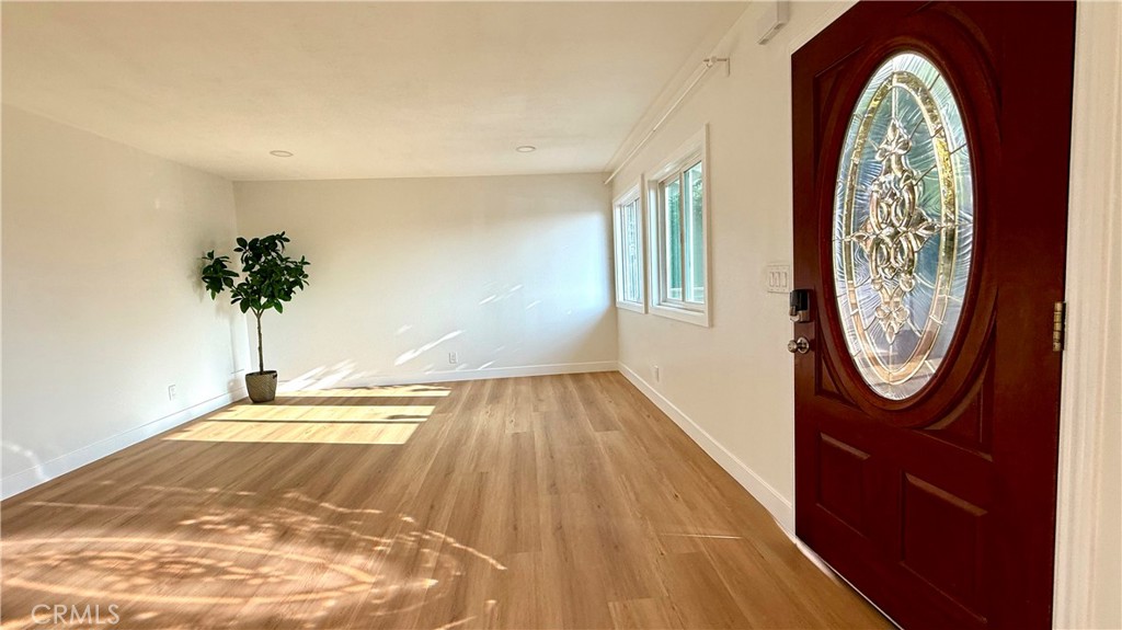 Recently upgraded with brand new luxury vinyl flooring and Chantilly Lace paint, this home features an open floor plan with abundant natural light, LED recessed lights, ceiling fans, wall furnace heating, and plenty of storage. Bright and spacious 2 bed / 1 bath upstairs unit in a quiet, well-maintained Huntington Beach community.
The brand new kitchen includes quartz countertops, tile backsplash, new cabinetry, pantry, dishwasher, gas stove/oven, and refrigerator. Bedrooms offer mirrored closet doors and extra storage, while the fully renovated bathroom boasts Andover White porcelain tile, a comfort-height toilet, and a floating vanity cabinet.
Enjoy a peaceful setting with on-site coin laundry (4 commercial washers + 4 dryers), Rental Option for reserved uncovered parking and garage parking. Free street parking. Water & trash included; tenant pays gas/electric. Pet-friendly.
Prime Location: Across from Bella Terra Mall (Costco, Costco Gas, Starbucks, Whole Foods, Kohl’s, restaurants, movie theater, Old World Village). Close to Target, Sprouts, Walmart, and South Coast Plaza. Easy 405 Freeway access. Minutes to Huntington Beach Pier, Pacific City, and local parks.