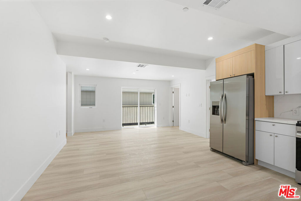 Experience modern luxury living in the heart of North Hollywood! This stunning, newly constructed 3-bedroom, 3.5-bathroom townhouse is part of an exclusive, brand-new 14-unit complex that blends contemporary design with high-end finishes and an unbeatable location.Inside, you'll find an expansive open-concept floor plan with soaring ceilings and an abundance of natural light. The chef's kitchen is equipped with top-tier appliances and premium finishes, while the living and dining areas offer a seamless flow, creating an ideal space for both entertaining and everyday living.The private primary suite is a true retreat, featuring an en-suite bathroom and a spacious walk-in closet. The additional bedrooms are thoughtfully designed and versatile, offering ample space for family, guests, or a home office. The rooftop deck provides the perfect spot to unwind, offering breathtaking views and ample room for outdoor living. This unit also includes in-unit laundry, plenty of storage, and energy-efficient systems for ultimate convenience and comfort. Located just minutes from the vibrant NoHo Arts District, Universal Studios, and an array of dining, shopping, and entertainment options, you'll be at the epicenter of all that North Hollywood and Hollywood have to offer. With two covered parking spaces and easy access to major freeways and public transit, your commute will be a breeze. Don't miss out on the chance to lease this brand-new luxury townhouse in one of L.A.'s most desirable neighborhoods.
