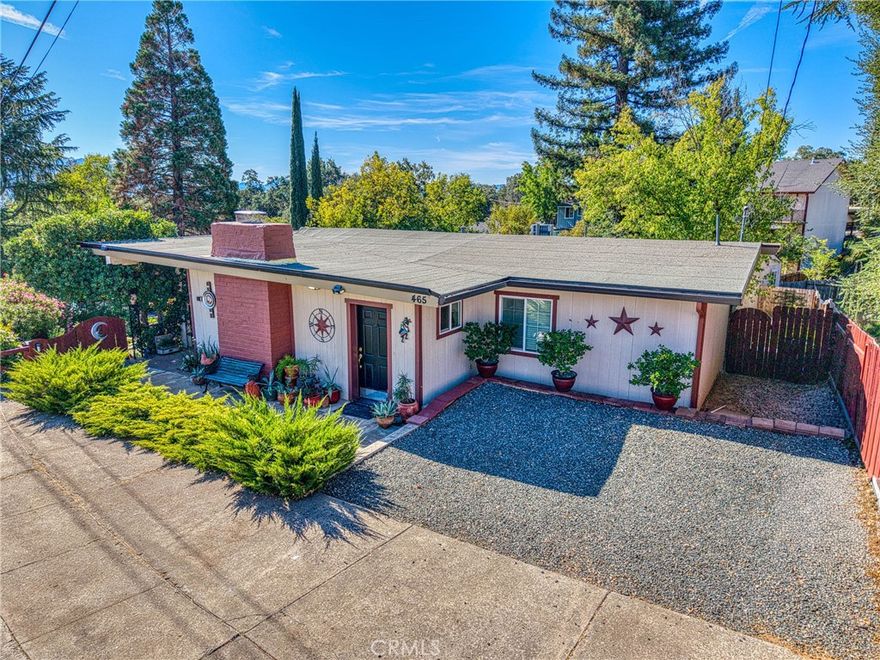 Beautifully landscaped, large, fenced yard in North Lakeport. Great neighborhood. 3-bedrooms, 3-bathrooms on 0.375 of an acre. NEWER ROOF- Roof replaced on home and shed is past  2 years! Main house is a spacious 2-bedroom, 2-bathrooms. Additional 1-bedroom 1-bathroom ADU also. Main house features bamboo flooring throughout. Mini split for heat and air. Living room has a wood stove, ceiling fan, large windows for natural lighting, and built in bookshelves/shelves. Kitchen features granite counter tops, wrap around counters, electric glass cook-top stove, deep sink, dishwasher and ceiling fan. Full guest bathroom with tiled flooring, large vanity, walk-in shower, separate tub, updated window and glass shelves. Stackable washer and dryer in hallway. Nice size guest bedroom with carpet, ceiling fan and a large closet. Large primary bedroom with carpet, ceiling fan and walk-in closet. Primary bathroom features a walk-in shower, dual sink and tile flooring. Covered front porch, large deck in back and lower sitting deck. BONUS ADU separate entrance featuring 1 bedroom with tile flooring, ceiling fan and large closet. 1-bathroom with walk-in tiled shower and tile flooring. Kitchenette featuring a sink, refrigerator, microwave, and living room has a ceiling fan. (Option of furnishings in ADU). Great rental income potential or N-Law unit. The utilities to the ADU run off the main house. Large shed in the back yard with a deck and walk-ways. Green lawn in back yard, lots of plants, flowers, raised beds, and multiple drains. French drains around property, and sump pump system under house. City water and city sewer. Walking distance to downtown Lakeport and close to the schools.