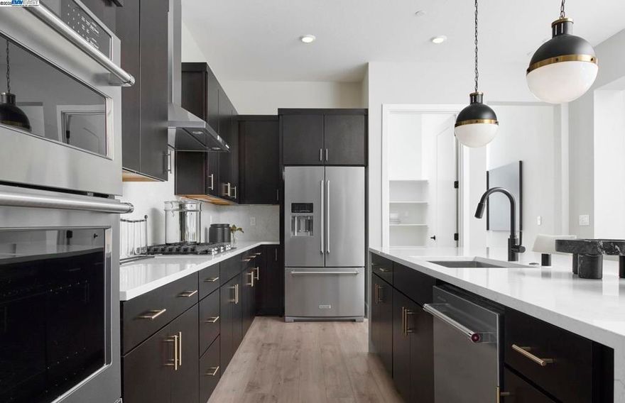 Del Webb at River Islands, in Lathrop, is a 55+, age-restricted, Active Adult community. A warm and welcoming home with an inviting courtyard entry, open flex space, and stylish kitchen. Relax under the covered patio taking in the views of the lake or fish from your dock.  This home comes with guest suite with living. Photos are of model home, not of actual home.