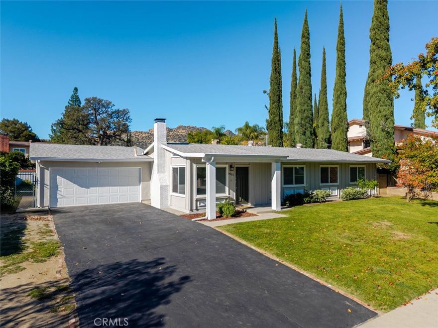 Charming 3-bedroom, 2-bath home for lease offering approximately 1,200 sq. ft. of comfortable living space in a desirable Chatsworth location. This bright and inviting residence features high ceilings, recessed lighting, and abundant natural light that enhances the clean white interior. The living room includes a cozy fireplace, creating a warm and welcoming atmosphere. The home offers a private front and back yard, perfect for outdoor enjoyment and entertaining.

Conveniently located near local parks, shopping, dining, and easy access to major freeways, this home provides a balance of neighborhood charm and everyday convenience. An attached 2-car garage includes built-in cabinets for extra storage and organization, along with a washer and dryer conveniently located in the garage. Additional highlights include mirrored closet doors, functional appliances, and a well-designed layout ideal for comfortable living.