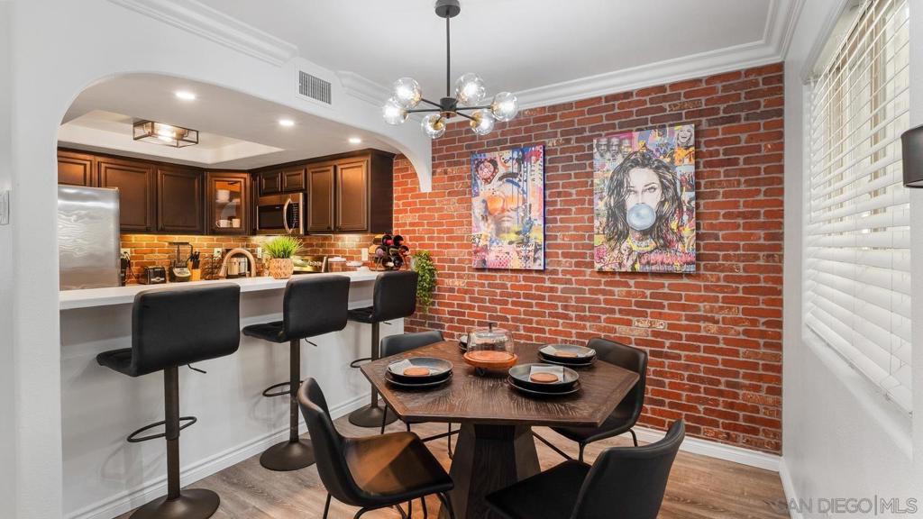 Discover modern city living in this **renovated 2-bedroom, 1-bath corner-unit condo** located in the heart of **Golden Hill**. This stylish home has been thoughtfully updated with **new vinyl flooring, quartz countertops, fresh paint, modern fixtures, and a striking brick accent wall**. Natural light fills the space, and the convenience of an **in-unit washer/dryer** and **all appliances included** makes it truly move-in ready. Step outside and enjoy a gated community with resort-style amenities: **pool, jacuzzi, BBQ area, fitness center, and exterior maintenance included**. You’ll also have **one assigned parking spot** and the peace of mind of a **pet-friendly community**. The location is unbeatable—**Balboa Park Golf Course is your backyard**, Downtown San Diego is just **5 minutes away**, and you’re within walking distance of Golden Hill’s best **restaurants, coffee shops, and local favorites**. With **Starbucks right next door** and quick freeway access, this condo offers the perfect blend of convenience and lifestyle.