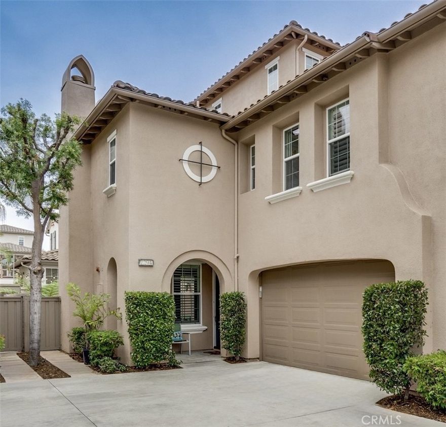 This home has been freshly painted inside and out and features luxury laminate flooring, 10-foot ceilings, and incredible natural light pouring in through multiple windows and glass doors. The open-concept main level is elegant and functional, including a custom-designed TV wall and great flow for entertaining.

The kitchen is stylish and practical, offering ample counter space and its own dedicated pantry room—ideal for everyday cooking or hosting.

Upstairs, you'll find three spacious bedrooms: a massive primary walk-in closet, a luxurious ensuite with dual sinks, and a huge dual shower area for a spa-like experience. One other room has a second walk-in closet, adding even more convenience. The versatile loft provides the perfect home office, fitness area, or family game room. 

Step outside into a vibrant backyard filled with grass, lush plants, and a built-in BBQ, creating a perfect setting for relaxation and entertainment. A dog door and a 2-car garage make daily living easy and efficient.

Bel Air residents enjoy access to resort-style amenities, including a sparkling pool, jacuzzi, and BBQ area, all within a clean, secure, and friendly community. The neighborhood has also recently been refreshed with new roof surfacing, clean gutters, resurfaced asphalt, and new exterior paint.

This is your chance to enjoy space, style, and comfort in one of Huntington Beach’s most desirable gated communities.