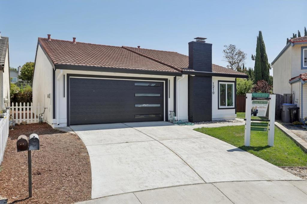 Welcome to this beautifully remodeled 3-bedroom, 2-bathroom home nestled at the end of a quiet cul-de-sac. Set on a larger triangular lot, this property has been fully updated with modern finishes and thoughtful design throughout. Step inside to wide-plank French oak flooring that flows seamlessly through the open living spaces. The living room features a custom entertainment center with built-in shelving, accent lighting, and an elegant electric fireplace that creates a warm and inviting atmosphere. The chefs kitchen has been completely redone with new cabinets, sleek quartz stone countertops, and stainless steel appliances perfect for both everyday living and entertaining. Both bathrooms have been tastefully modernized with new vanities, showers, and contemporary fixtures. Fresh paint, new siding, windows, and a brand-new garage door add to the homes curb appeal and peace of mind. Outside, the backyard offers new pavers, a lush lawn, and plenty of space for kids and gatherings. Conveniently located near BART, major freeways, and shopping, this home blends comfort, style, and accessibility.
