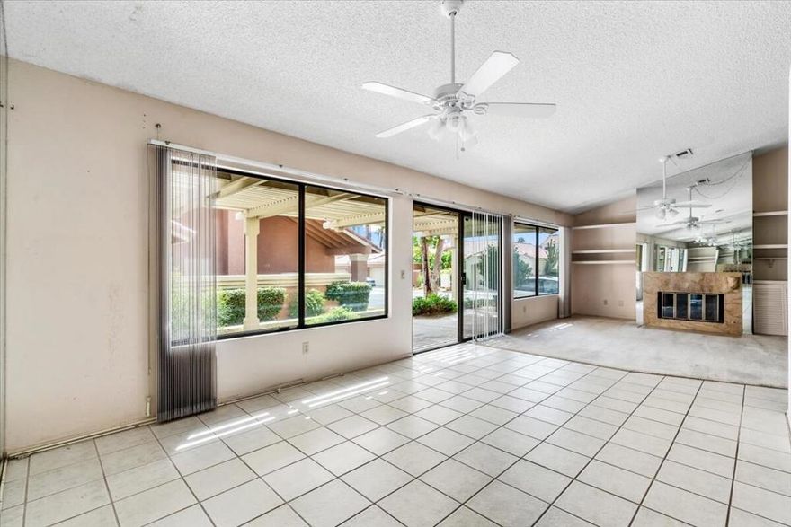 Discover potential in this 3BD/3BA property within the prestigious Oasis Country Club, offering 1,796 sq. ft. of possibility. This HUD-owned residence features a cozy living room with a fireplace, creating a welcoming atmosphere. The third bedroom provides versatility, boasting both private outdoor and interior entry points, ideal for a creative workspace, hobby area, or guest quarters, complete with a handy Murphy bed. Oasis CC is a member-owned community where all amenities, including the golf course, are managed on-site, offering varied membership options tailored for discerning homeowners. While the property awaits your personal touch to shine, enjoy the security of a well-managed community with fabulous amenities such as golf, tennis and pickleball. Exceptional dining can be found in the grill room, dining room and lounge. There are different types of golf memberships available to homeowners. Also an annual food and beverage minimum of $780 each unit is responsible to spend each year. There is a monthly loan payment of $36 per owner for the state-of the- art golf course irrigation project. Enjoy the benefit of energy savings with a leased solar system.