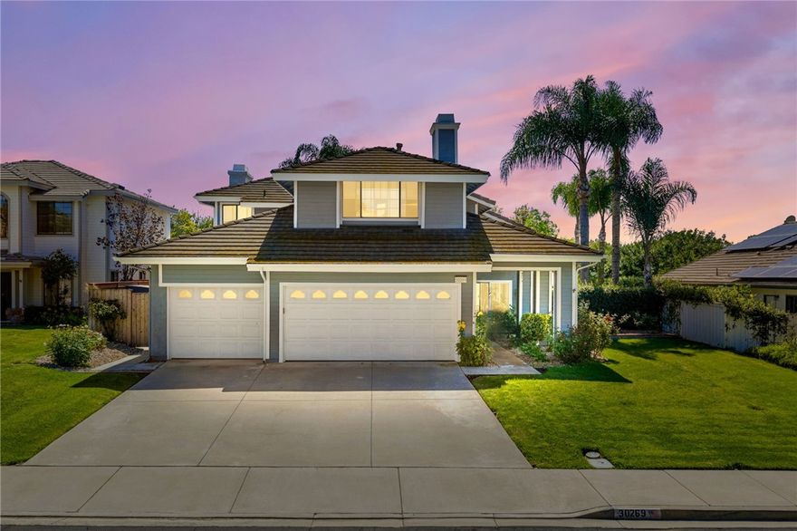 Welcome to the heart of Temecula where this beautifully remodeled 5-bedroom pool home sits on a quiet cul-de-sac in the desirable Villages community, just minutes from Temecula Wine Country that is globally recognized and considered a top destination on the world stage for wine! This lovingly maintained home by the same owners the past 24 years, has been transformed with a stunning remodel that truly elevates its beauty. The removal of the wall between the kitchen and dining room creates a bright and open flow, complemented by new light-toned LVP flooring that gives the home a breezy, modern feel. The kitchen shines with crisp white cabinetry, sleek counters, stylish backsplash, and stainless steel appliances, while new downstairs windows and a tankless water heater enhance both comfort and efficiency. Curb appeal abounds with lush green grass and an inviting covered entry that sets the tone for the stylish interior. Inside, on-trend designer touches carry throughout, including a downstairs bedroom with direct access to a full bath, perfect for guests or multi-generational living. Upstairs, the spacious primary suite boasts its own private balcony, dual sinks, and a separate tub and shower, while three additional bedrooms share a full bath. Step outside to your private backyard retreat where the sparkling pool, redone in 2021 with features like a built-in bench and umbrella holder, is ideal for both play and relaxation, and the bubbling spa invites you to unwind under swaying palms in the gentle Temecula breeze. You will also enjoy a solid patio cover and low maintenance landscaping!  With close proximity to top-rated schools, shopping, dining, and all the charm of Temecula, this is more than a home—it’s the lifestyle you’ve been waiting for.