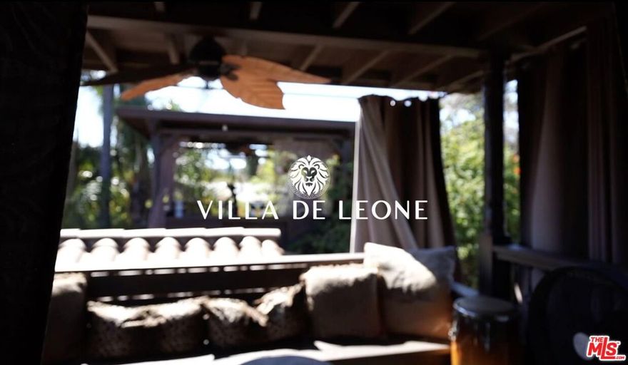 Villa de Leone: A Masterpiece of Baroque Elegance and TranquilityStep into a world where grandeur and serenity exist in perfect harmony. Villa de Leone, a resplendent Baroque-style sanctuary, is a home unlike any othernominated by HGTV as one of Los Angeles' most beautifully unique residences.Architectural Digest recently noted the resurgence of Baroque design, stating:"Baroque is making a bold comeback in contemporary interiors, with its signature opulence, intricate detailing, and dramatic flourishes reinterpreted through a modern lens. From sculptural furnishings to richly layered textures, today's designers are embracing the grandeur of the past to create spaces that feel both timeless and indulgent."  Architectural DigestEvery inch of this meticulously crafted 3-bedroom, 2-bathroom retreat has been designed to transport you, offering an immersive experience in old-world European opulence with modern refinement.A Living MasterpieceThe moment you cross the threshold, the weight of the day dissolves. Sunlight spills through French doors, dancing across hand-gilded moldings, sculpted archways, and architecturally authentic statuary. The living room, a symphony of Baroque grandeur, is as much a statement of design as it is a space for quiet repose. A sense of timeless elegance pervades, with professionally-commissioned muraled ceilings and delicate ornamentation that whisper of European chteaus and European Rivieras.A Sanctuary of Gardens and WaterBeyond the living room, ornate double doors lead to the European-inspired front garden, where the gentle murmur of a sculptural water feature sets the tone for relaxation. Mature palm and olive trees frame a tableau reminiscent of a Greek Island escape, while hand-laid stone pathways invite singular moments of contemplation. As dusk falls, the fire pit glows, flickering against the evening sky, offering a serene contrast to crisp breezes.An Outdoor Oasis of Leisure & CelebrationStep beyond and find yourself in an outdoor sanctuary curated for both entertainment and solitude. A shimmering in-ground pool reflects the changing hues of the sky, surrounded by lush greenery, a lavish custom bar, and an elegantly appointed outdoor kitcheneach element contributing to an ambiance of effortless luxury.At the heart of this space lies a transformative outdoor dining areaa sumptuous al fresco setting by day, an enchanting dance floor by night. As dinner concludes, the space seamlessly transitions, allowing guests to celebrate beneath the stars with music, movement, and candlelit ambiance.The bubbling hot tub, positioned beneath a canopy of twinkling lights, invites long evenings of indulgence, while architecturally significant statues stand as silent sentinels of refinement.An Evening Under the StarsAs twilight settles, the outdoor movie theater beckons. Plush seating, an expansive screen, and the soft rustling of trees in the evening breeze set the stage for an unparalleled cinematic experience. Whether hosting intimate gatherings or reveling in solitude beneath the starlit sky, this space becomes an extension of the home's commitment to artful living.Creative & Wellness SpacesA Private Music RetreatFor those who seek inspiration, a dedicated music studio offers a space for creativity, featuring professional-grade soundproofing, vintage-style dcor, and state-of-the-art recording equipment. Whether composing, producing, or simply indulging in the beauty of sound, this space is designed to elevate artistic expression.A Refined Home OfficeAdjacent to the music studio, a sophisticated home office awaits. Designed with handcrafted wood paneling, custom built-ins, and ample natural light, it is the perfect setting for focused work, deep reflection, or quiet study. This refined workspace blends luxury and productivity, offering a private retreat for the modern professional.An Exclusive Outdoor GymFor those who prioritize wellness, the outdoor gym on the private terrace offers an invigorating space for