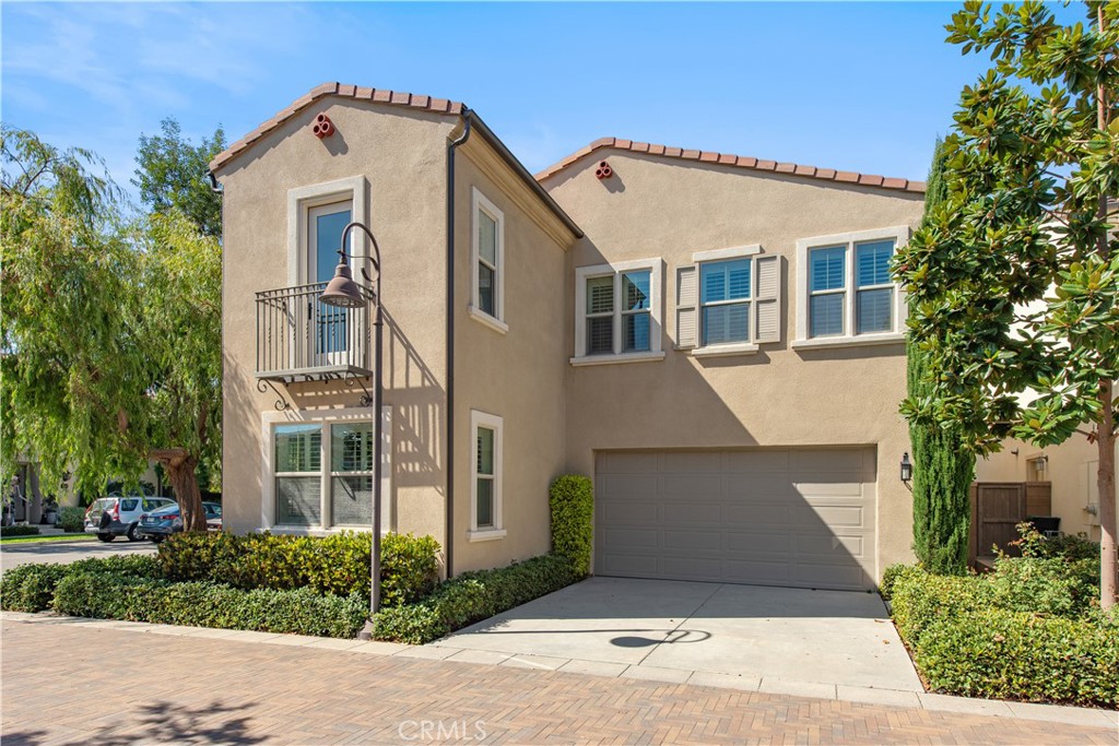 Located in the highly sought-after Portola Springs village of Irvine, this elegant 4-bedroom, 3.5-bath residence sits on a premium corner lot, offering exceptional privacy, abundant natural light, and beautiful curb appeal. The home features a rare full driveway and an attached two-car garage.
Step inside to an inviting open-concept floor plan with modern flooring, neutral designer paint, and custom wood shutters throughout. The spacious great room connects seamlessly to the chef's kitchen, featuring quartz countertops, full back splash, a centeral island, upgraded cabinetry, and stainless-steel appliances perfect for entertaining or everyday living.
The first-floor guest suite offers privacy and flexibility for visitors, extended family, or a home office. Upstairs, the luxurious primary suite features a spacious walk-in closet and a spa-inspired bathroom with dual vanities and a walk-in shower. Two additional bedrooms, a full bath with double sinks, a convenient laundry room, and a versatile loft with its own private deck complete the upper level, providing the perfect space for work, play, or relaxation.
Enjoy true California living in the wrap-around private backyard, ideal for outdoor dining or quiet moments under the sun. Energy efficiency is built in with paid-off solar panels, a tankless water heater, and a whole-home water-softening system.
Within walking distance to top-rated Portola Springs schools, parks, and scenic trails, and just minutes from shopping, dining, and major freeways, this turnkey home offers the perfect blend of comfort, style, and modern convenience.