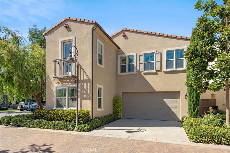 Located in the highly sought-after Portola Springs village of Irvine, this elegant 4-bedroom, 3.5-bath residence sits on a premium corner lot, offering exceptional privacy, abundant natural light, and beautiful curb appeal. The home features a rare full driveway and an attached two-car garage.



Step inside to an inviting open-concept floor plan with modern flooring, neutral designer paint, and custom wood shutters throughout. The spacious great room connects seamlessly to the chef's kitchen, featuring quartz countertops, full back splash, a centeral island, upgraded cabinetry, and stainless-steel appliances perfect for entertaining or everyday living.



The first-floor guest suite offers privacy and flexibility for visitors, extended family, or a home office. Upstairs, the luxurious primary suite features a spacious walk-in closet and a spa-inspired bathroom with dual vanities and a walk-in shower. Two additional bedrooms, a full bath with double sinks, a convenient laundry room, and a versatile loft with its own private deck complete the upper level, providing the perfect space for work, play, or relaxation.



Enjoy true California living in the wrap-around private backyard, ideal for outdoor dining or quiet moments under the sun. Energy efficiency is built in with paid-off solar panels, a tankless water heater, and a whole-home water-softening system.



Within walking distance to top-rated Portola Springs schools, parks, and scenic trails, and just minutes from shopping, dining, and major freeways, this turnkey home offers the perfect blend of comfort, style, and modern convenience.