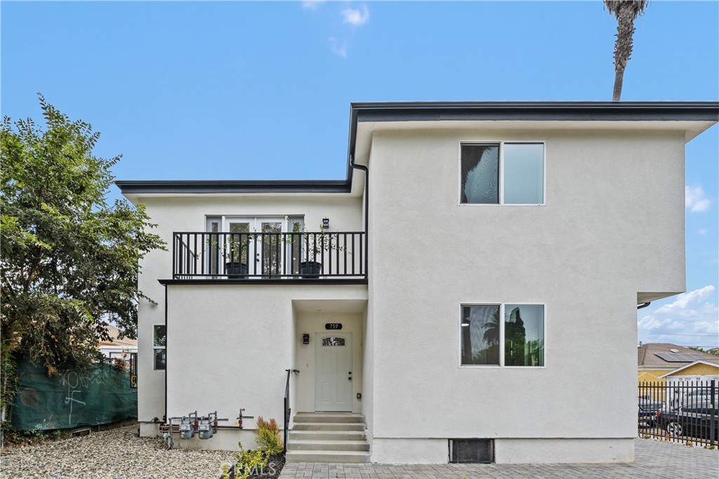 Modern new construction in the heart of Downtown Los Angeles, featuring three sleek, contemporary units with open-concept layouts and a Prime location offers easy access to dining, entertainment, and city living at its finest. Live in one unit and rent out the other two or rent out all three units! Paid off Solar. Downstairs units (2 units) share one water meter, upstairs unit has its own water meter.
