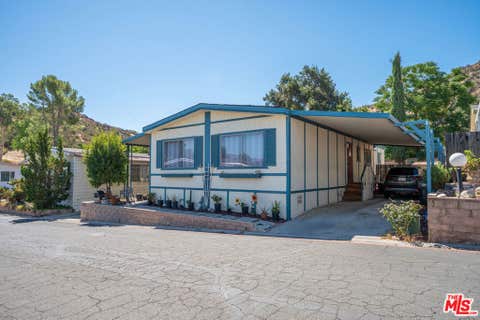 Photo of 27722 Moonridge Lane #27, Castaic, CA 91384 (MLS # 26875275)