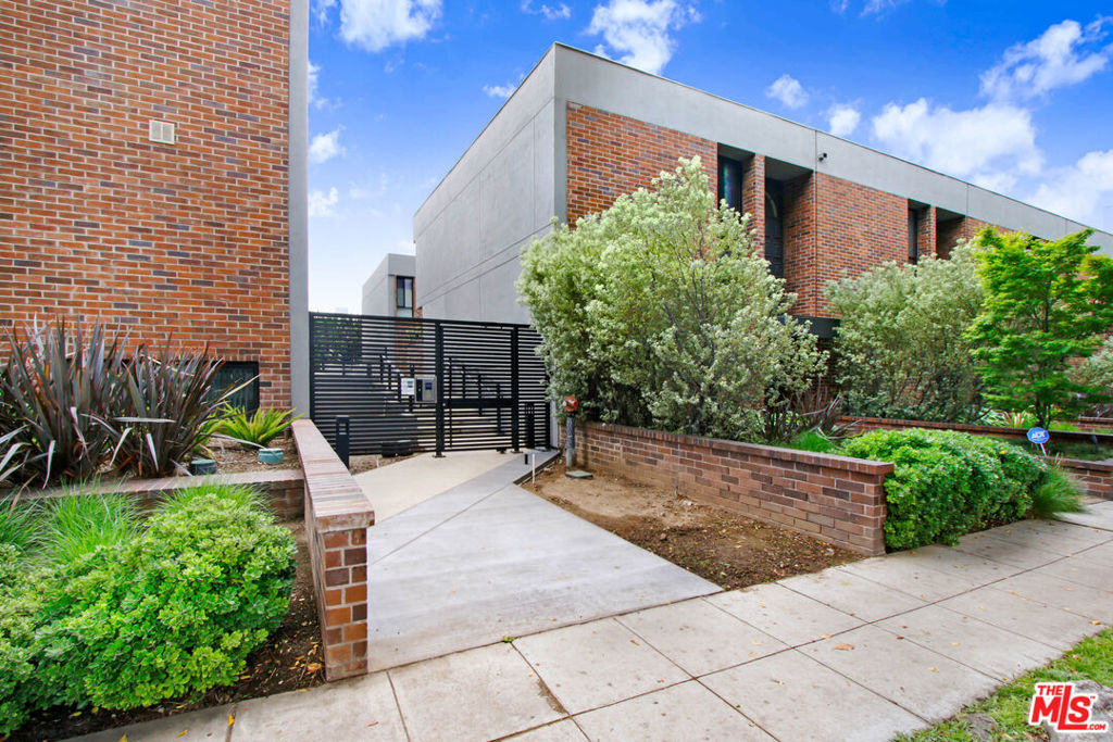 Prestigious luxurious three story townhome located in the prime location in the heart of Beverly Hills! Just walking distance from the infamous shopping hot spot of Rodeo Drive and Beverly Hills' upscale shopping and restaurants. This beautiful three bedroom three bathroom townhome encompasses a large master bedroom suite with luxurious bathroom with freestanding tub and steam shower, along with organized storage or walk in closets for each and every bedroom. High ceilings and living room space with all around illuminating lighting and crown moldings, accompanied by bar area, along with Crema Marfil polished Marble tiles and handsome hardwood floors all throughout. Updated kitchen with stainless steel appliances and direct access to two car parking space. Relax and enjoy leisure time on the 300 sq ft of outside private patio with surrounding LED lighting and BBQ. Enjoy living the Beverly Hills lifestyle!